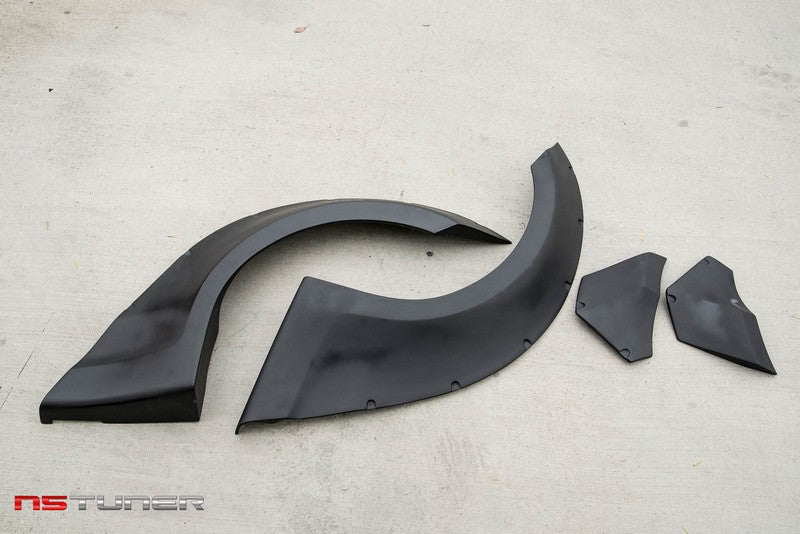 Rear Wide Body Flares for the BMW 1 Series E82 E88 135i 128 in Carbon Fiber and Fiberglass
