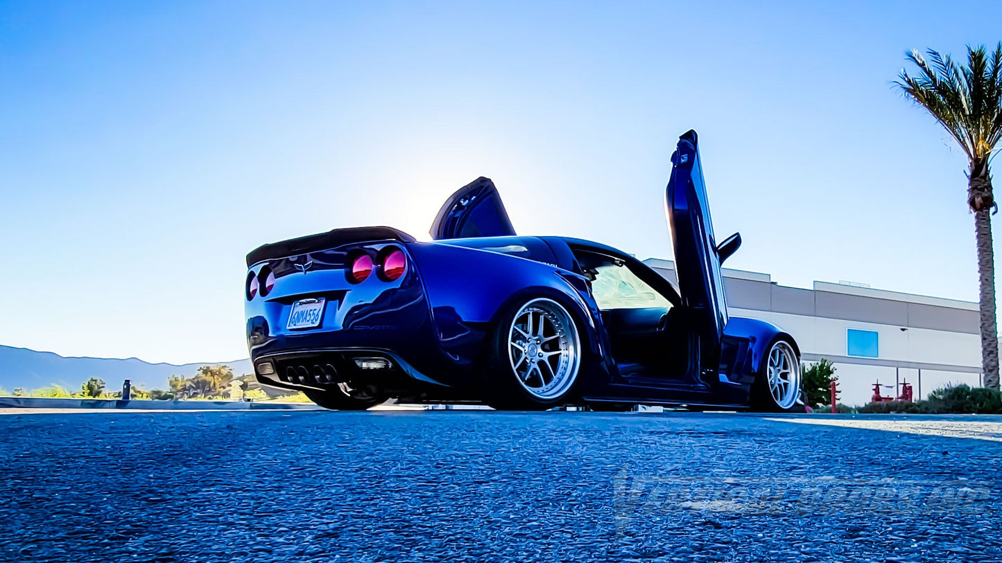 Zach's Chevrolet Corvette C6 from California, featuring Vertical Door conversion kit by Vertical Doors, Inc. AKA "Lambo Doors" VDCCHEVYCORC60508 #Corvettec6 #Chevrolet #vette #C6 #widebody #LamboDoors #VerticalDoors